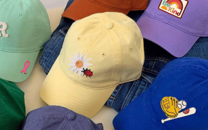 A group of hats with different designs on them.