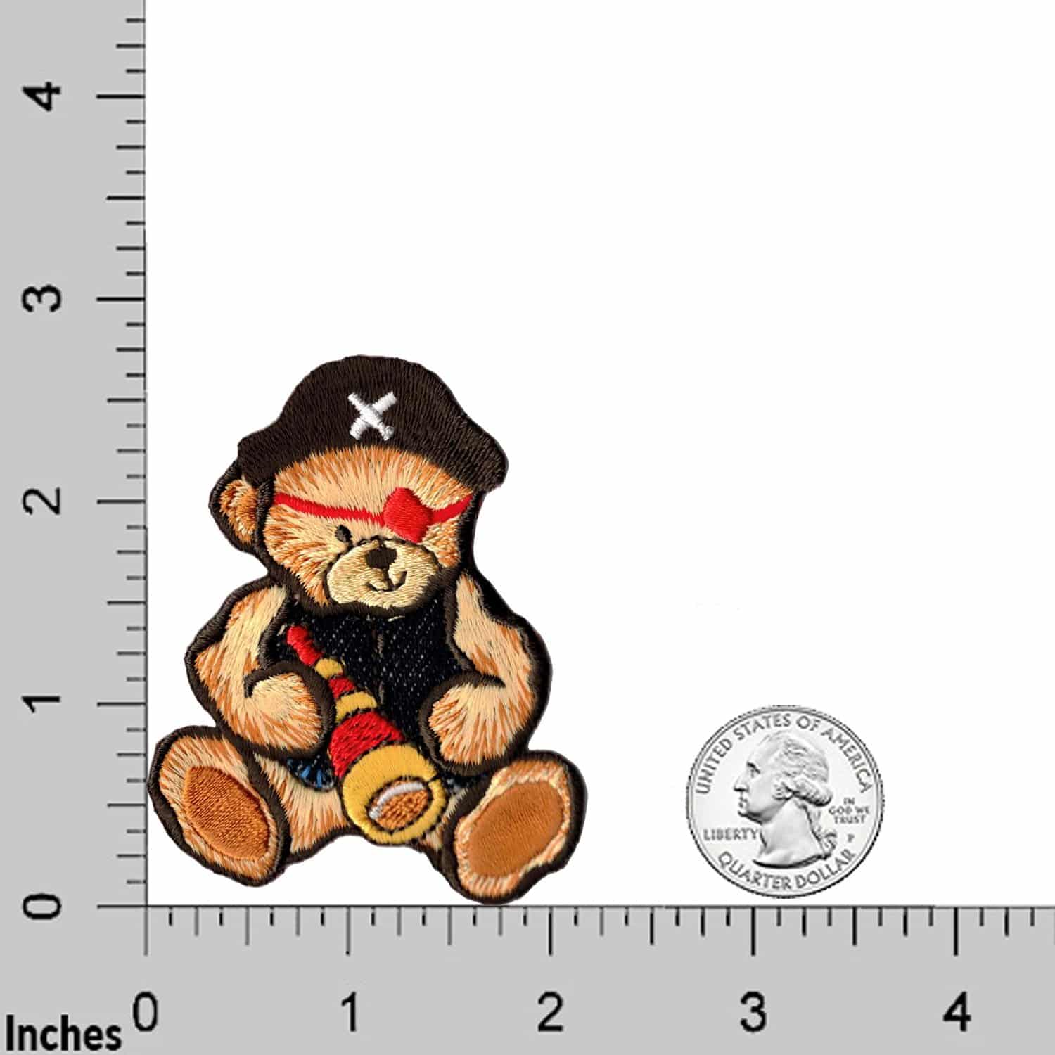 A Teddy Bear Patches (2-Pack) Children Embroidered Iron On Patch Applique with a pirate hat is shown next to a ruler.