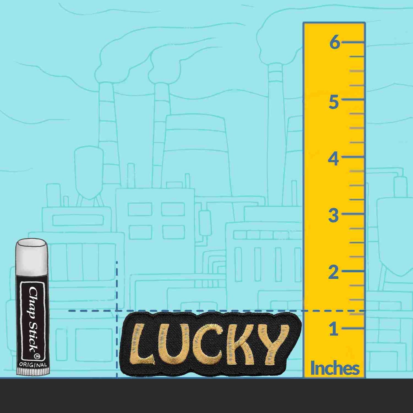 A ruler with the Lucky Iron On Patch next to it.