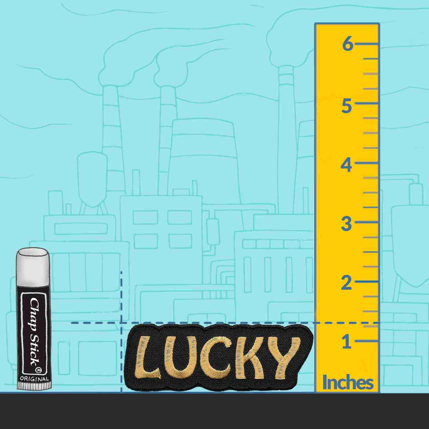 A ruler with the Lucky Iron On Patch next to it.