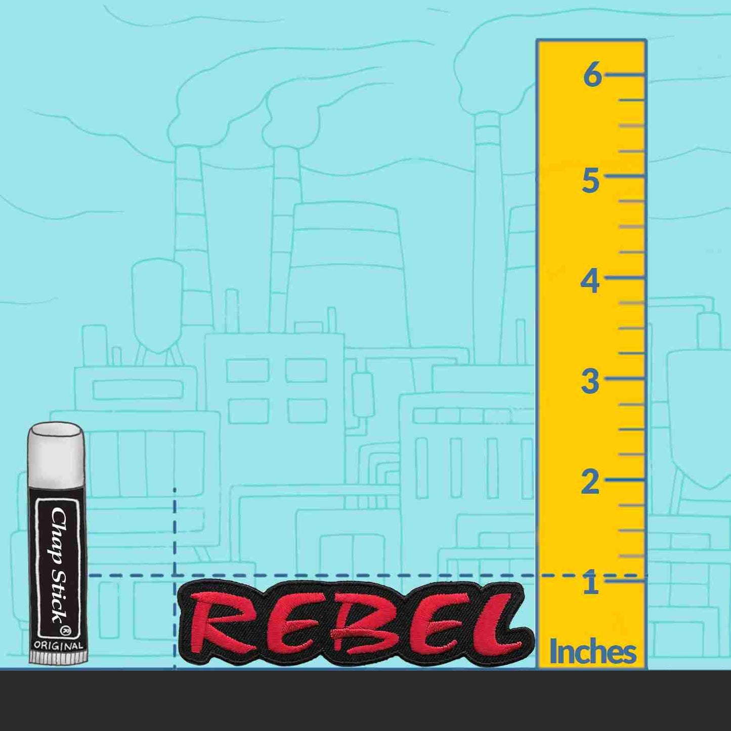 A ruler with the REBEL Iron on Patch next to it.