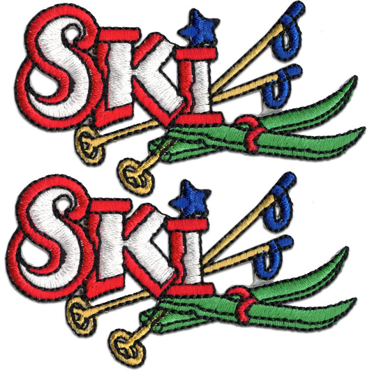 Laughing Lizards' Skiing "Ski" with Equipment Iron On Sports Patch 2-Pack features red and white "SKI" text, crossed poles, green skis, and a blue star above the "I". Ideal for ski enthusiasts. Displayed on a white background.