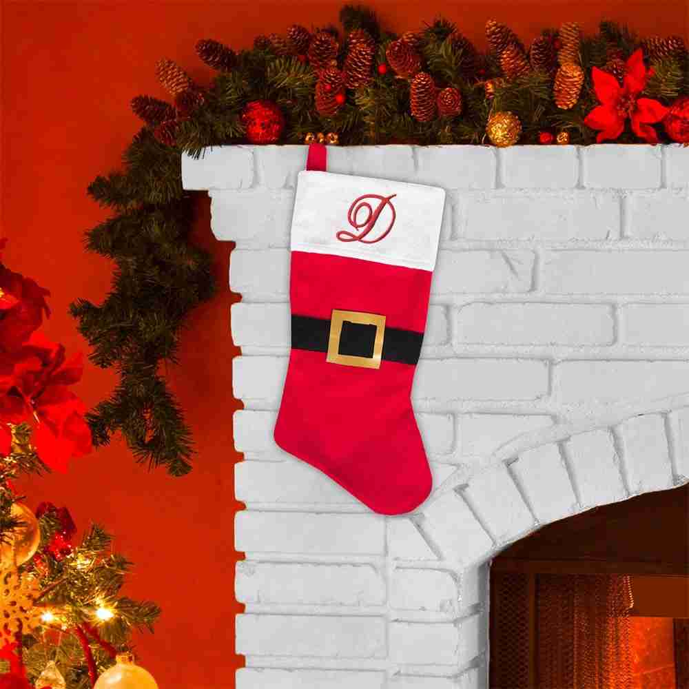Personalized Iron On Script Letter Patches, Monogram Appliques santa stocking hanging on a fireplace.