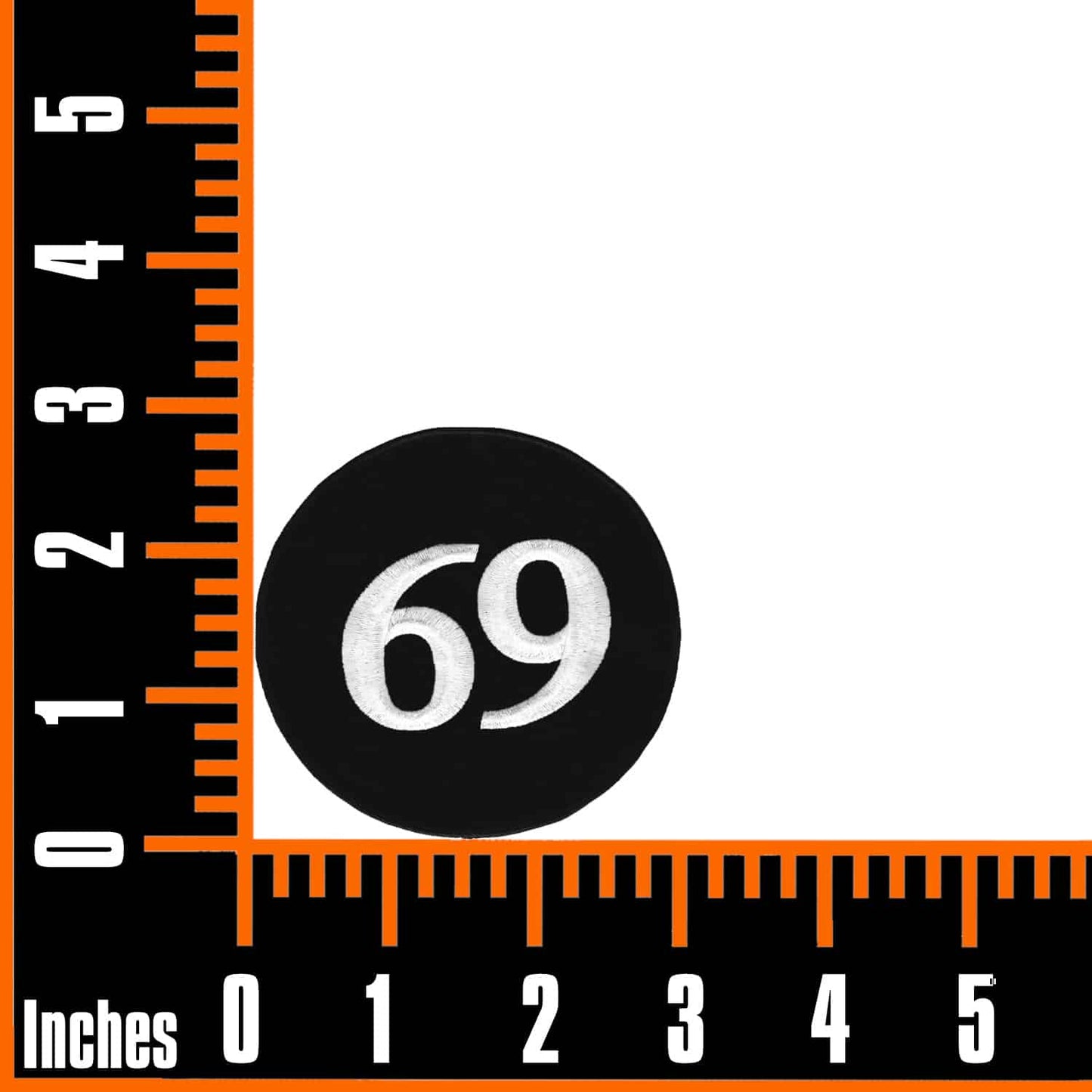 A ruler with the 69 Embroidered Iron On Patch - 3" Round on it.