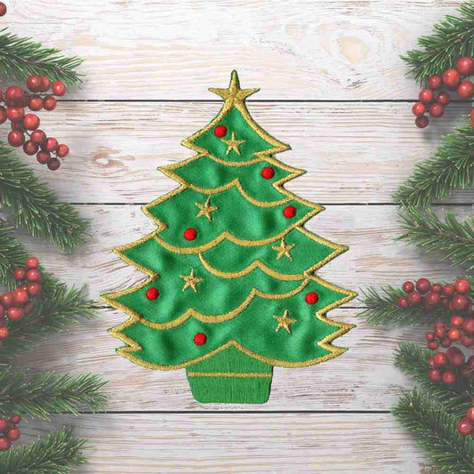 A Christmas Tree Holiday Iron On Patch embroidered on a wooden background.