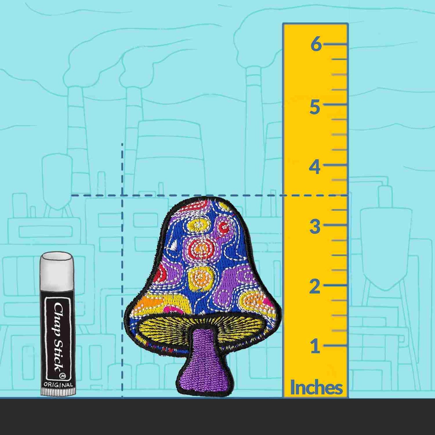 A Swirly Magical Mushroom Iron on Patch with a ruler next to it.