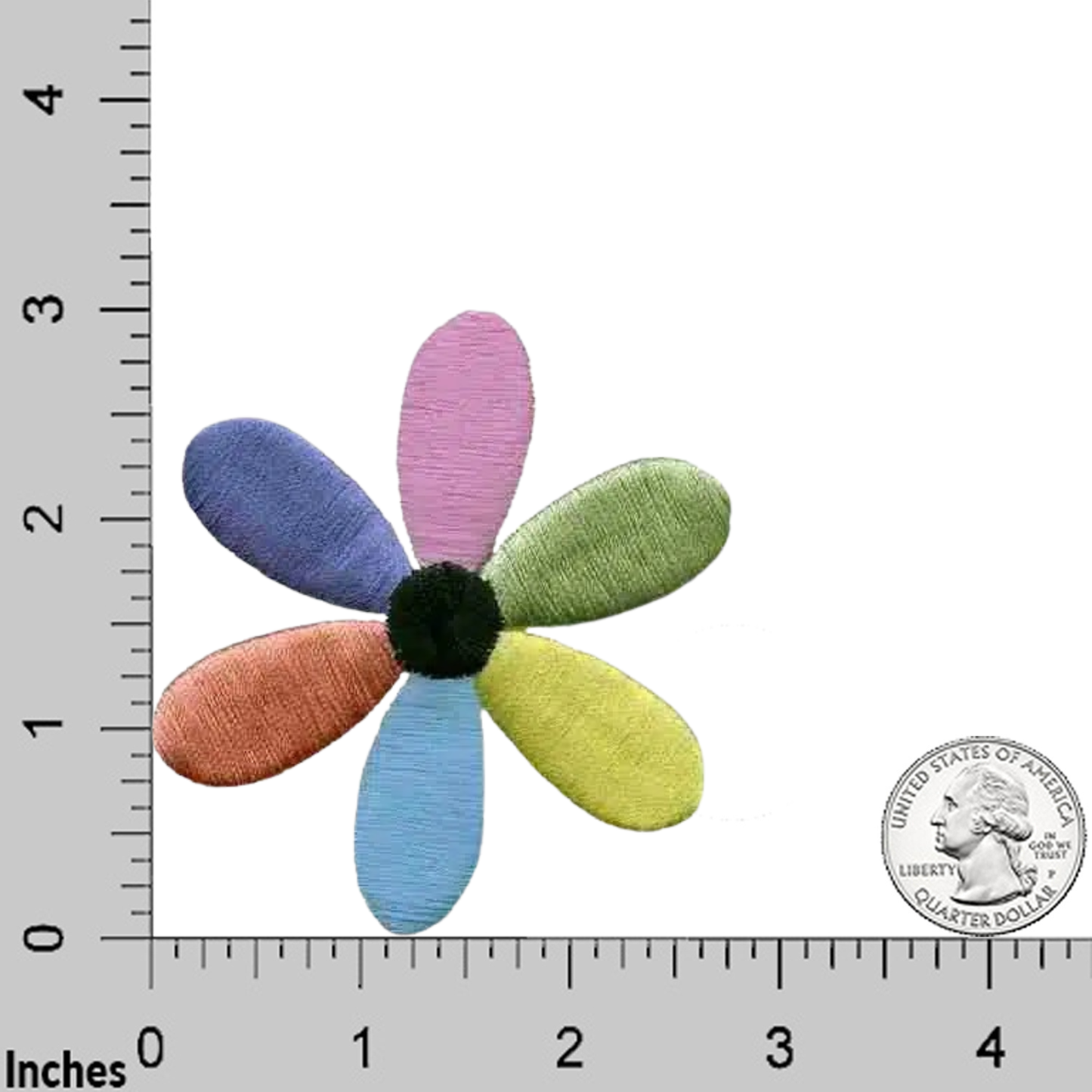 The Laughing Lizards 6-Petal Pastel Colored Daisy Flower Floral (2-Pack) Iron On Patch is shown beside a U.S. quarter and an inch ruler for scale.