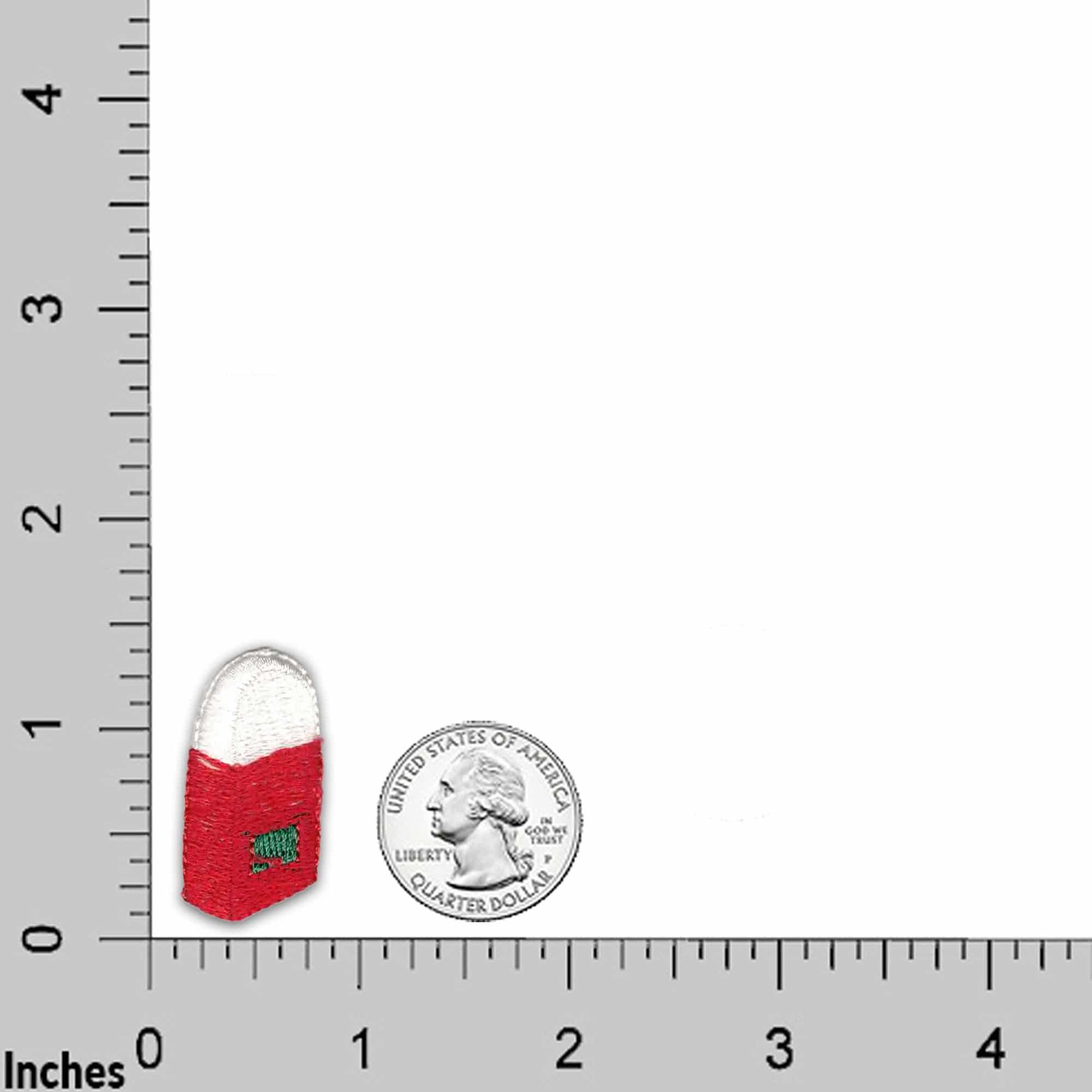 A red 57 Chevy (2-Pack) Iron On Patch and white pill box next to a ruler.