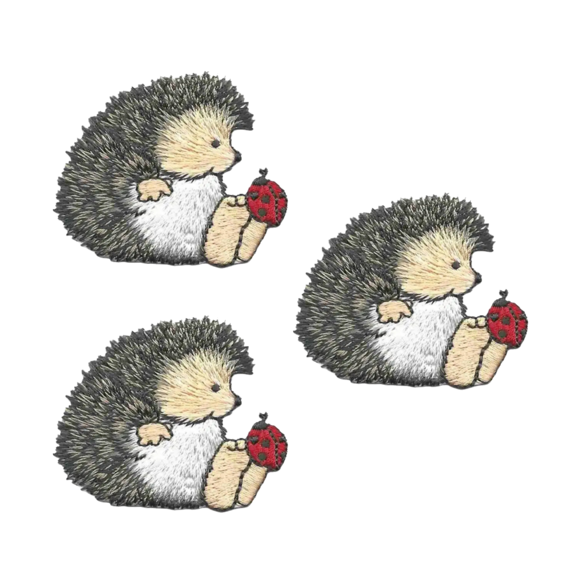 The Laughing Lizards Cute Hedgehog Patch with a Ladybug on its Toes (3-Pack) features three identical iron-on patches, each showing an embroidered hedgehog holding a red ladybug—perfect for personalizing your items.