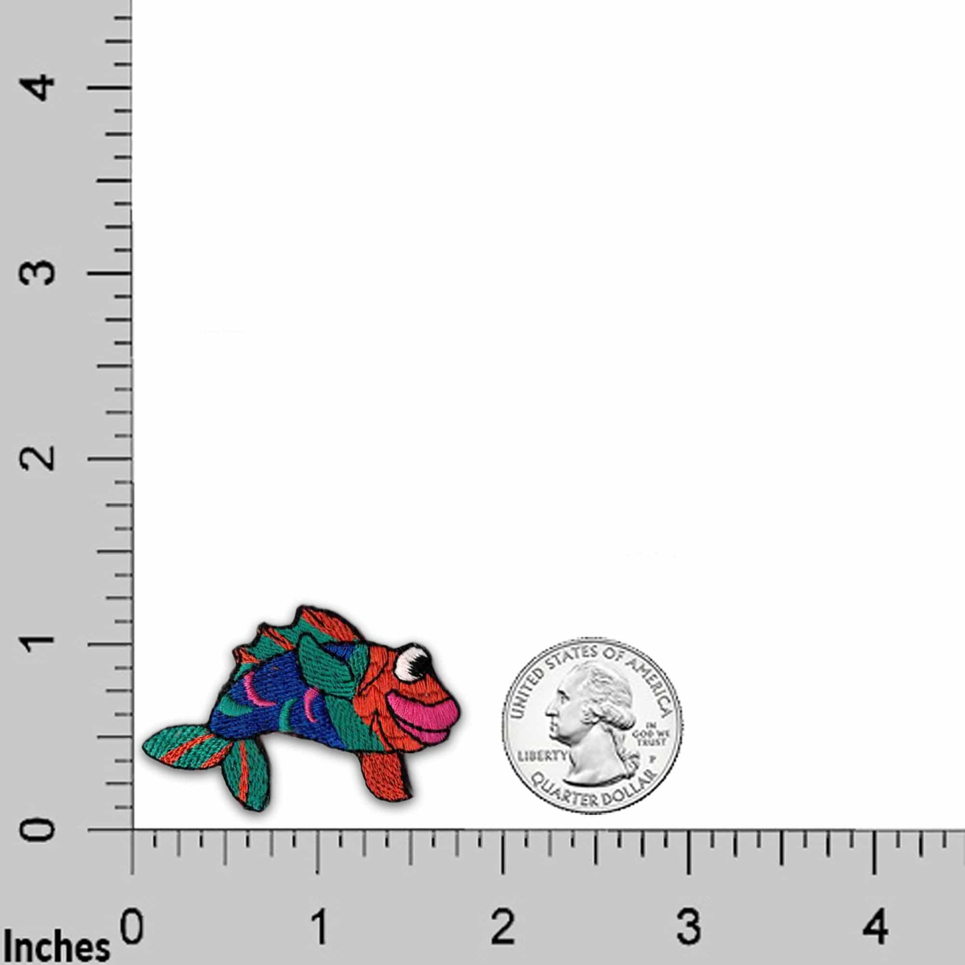 A Red 57 Chevy (2-Pack) Iron On Patch next to a ruler.