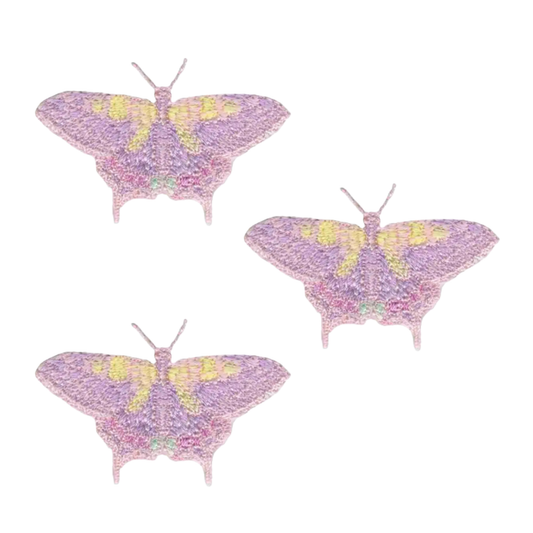 Three Laughing Lizards Light Pink Old World Swallowtail Butterfly SMALL Iron on Patches (3-Pack) are arranged in a triangle on white—perfect for adding a unique touch to your clothing accessories.