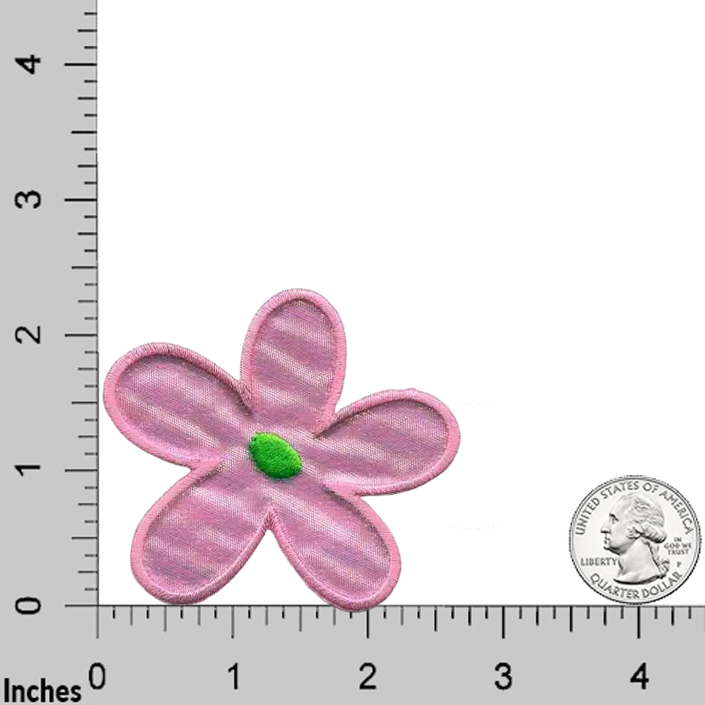 The Laughing Lizards Hippie Iridescent Flower in PINK Sixties (3-Pack) iron-on patch, featuring a pink five-petal flower with a green center, is shown on an inch-marked grid beside a U.S. quarter for size reference.