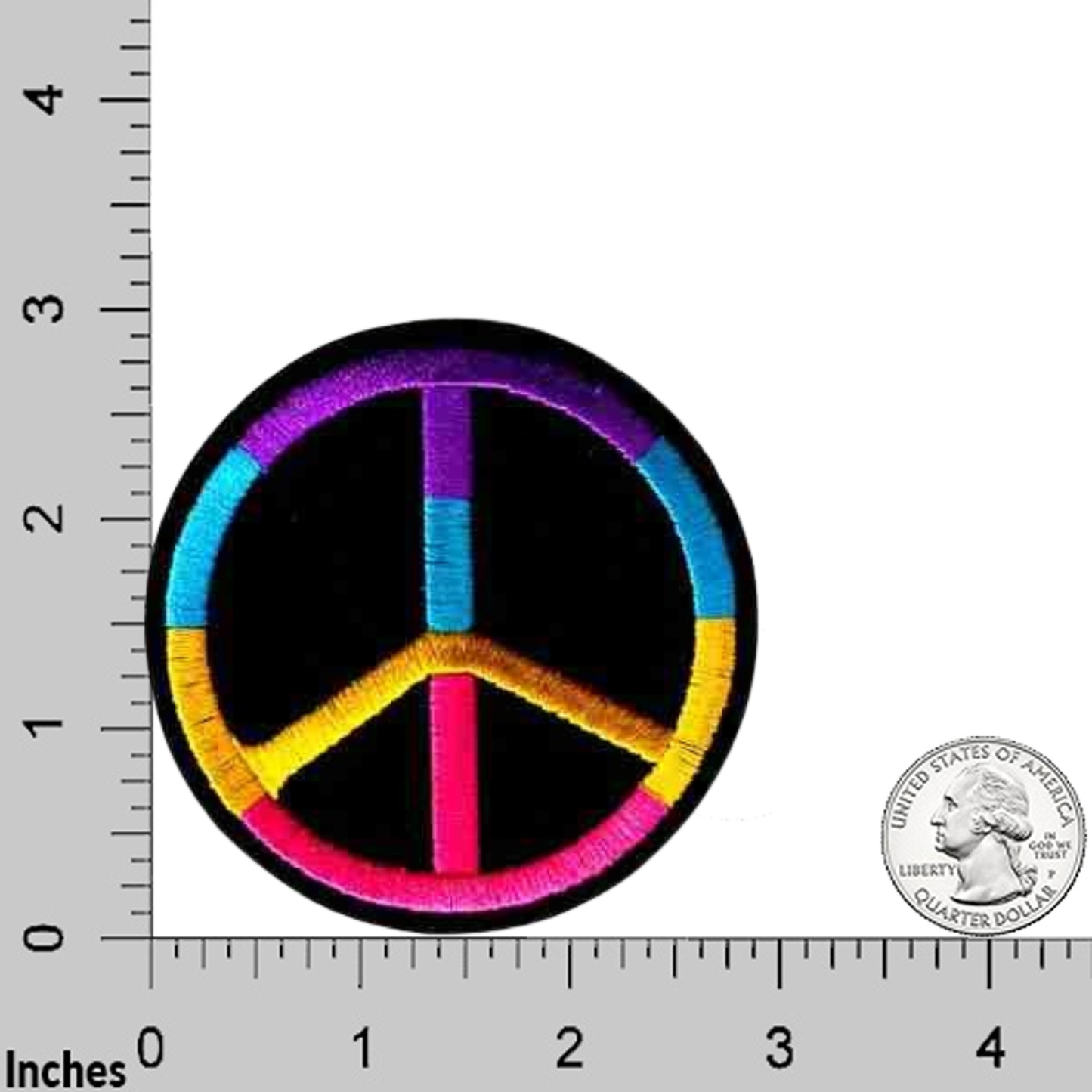 The Laughing Lizards Rainbow Peace Sign on Black Felt (2-Pack) Iron On Patch is pictured beside a U.S. quarter and ruler for size—ideal as a DIY craft accessory or peace sign iron-on patch.