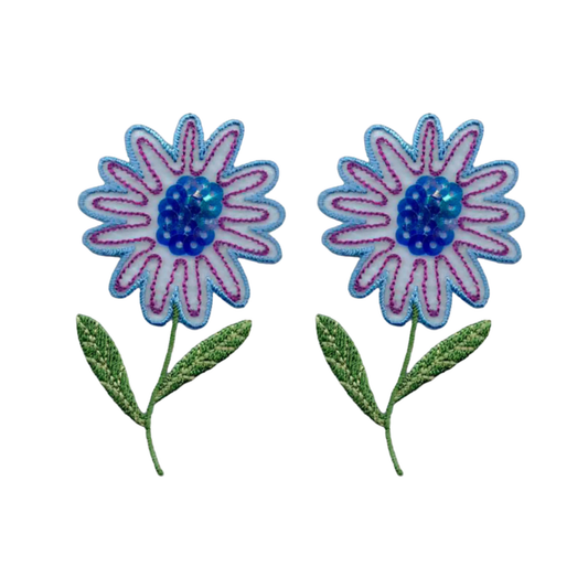 Add colorful flair to kids’ clothes with Laughing Lizards' Sequin Flower (2-Pack) Iron On Patch in blue/purple—two embroidered flowers with sparkly sequins for easy, fun decoration.