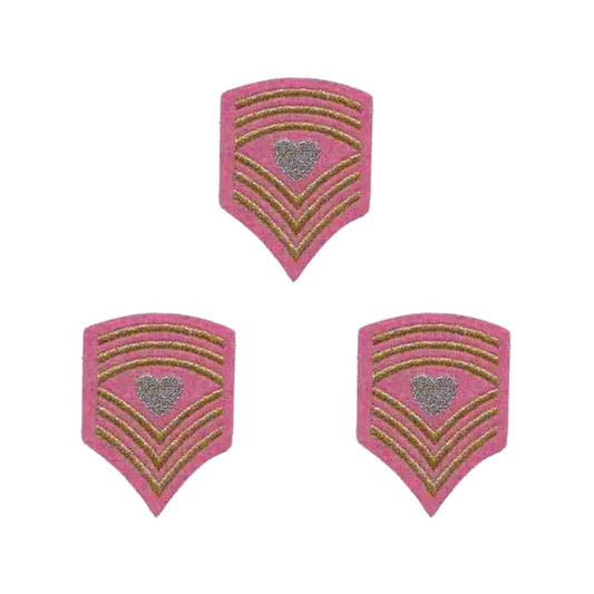 The LaughingLizards Sergeant Heart Chevron (3-Pack) Iron On Patch - Pink features three embroidered patches with gold chevrons and a silver heart, displayed in a triangular arrangement on a white background.