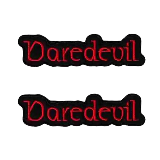 The LaughingLizards DAREDEVIL Namedrop (2-Pack) Iron On Patch features two matching black patches with red gothic "Daredevil" embroidery—great for DIY crafts or adding to jackets and bags.