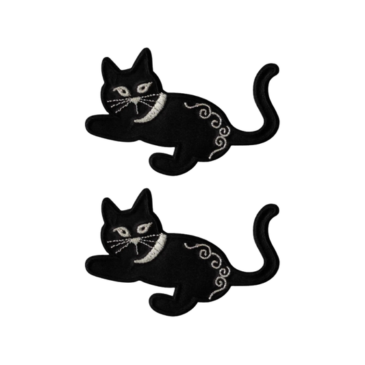 The LaughingLizards Satin Playful Kitten in Black (2 Pack) Iron on Patch features two identical black kitten patches with white details—perfect for adding a playful accent to kids' clothing or accessories.