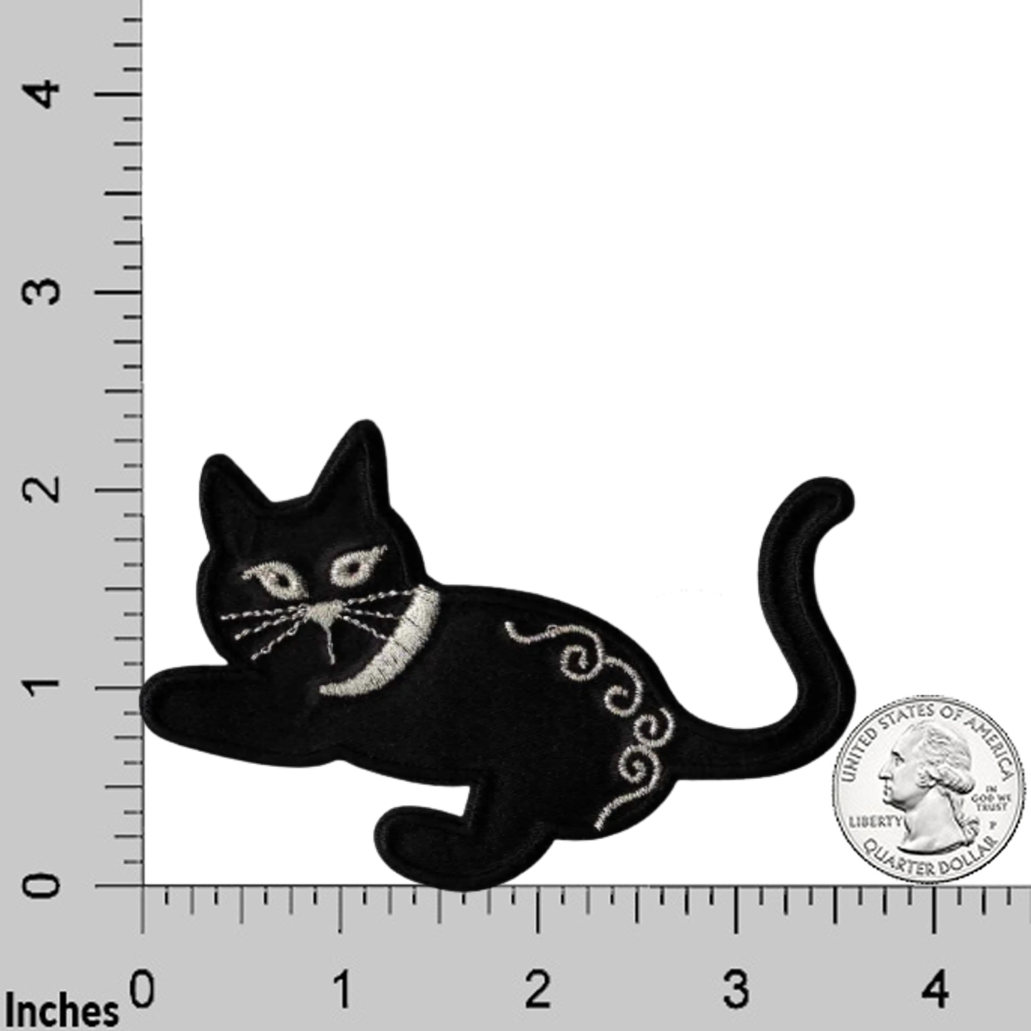 The LaughingLizards Satin Playful Kitten in Black (2 Pack) iron on patches are embroidered in black and white, each about 3 inches wide—ideal for kids’ clothing and patch projects. Shown with a U.S. quarter and ruler for size reference.