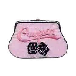 The Coin Purse "Cruisin" (3-Pack) Iron On Patch by LaughingLizards features a small pink purse with "casper" and two black dice on the front, evoking a playful 1950s patch style.