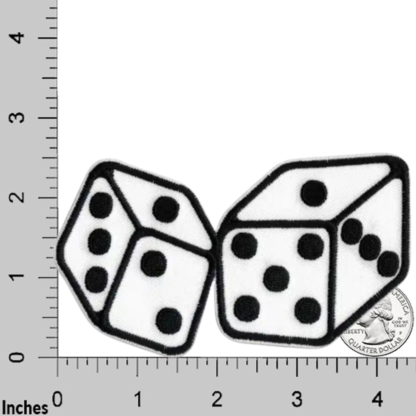 Laughing Lizards White Large Dice (2-Pack) Iron On Patch features embroidered white dice with black dots. Shown with a ruler grid and U.S. quarter for scale—ideal for DIY crafts or as a fun patch accessory.
