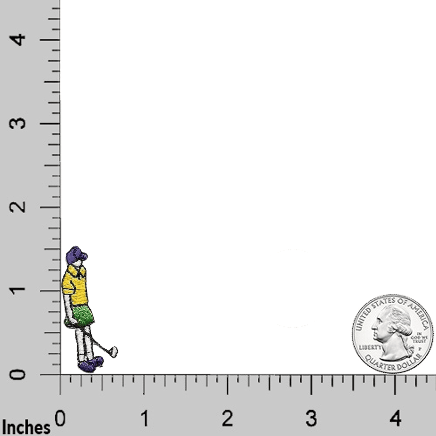 A Tiny Golfer Applique In Yellow from Laughing Lizards is shown by the 0-inch mark on a ruler, with a U.S. quarter near the 4-inch mark for scale; sold in a 5-pack as an iron-on patch.