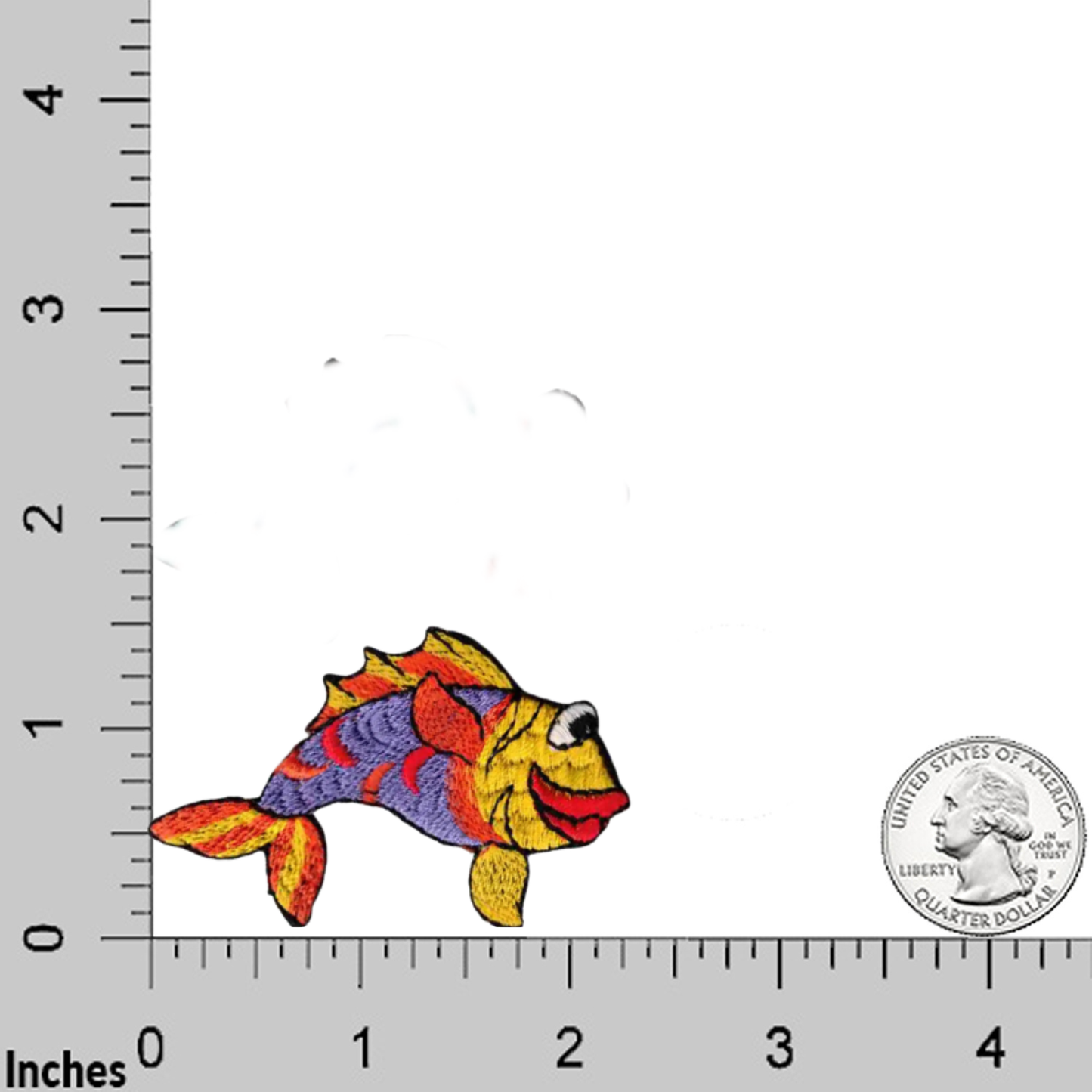 A Bubba Lips Fish (3-Pack) Iron On Patch by Laughing Lizards, shown in multiple colors, is placed next to a U.S. quarter on a grid with inch measurements along the edges.
