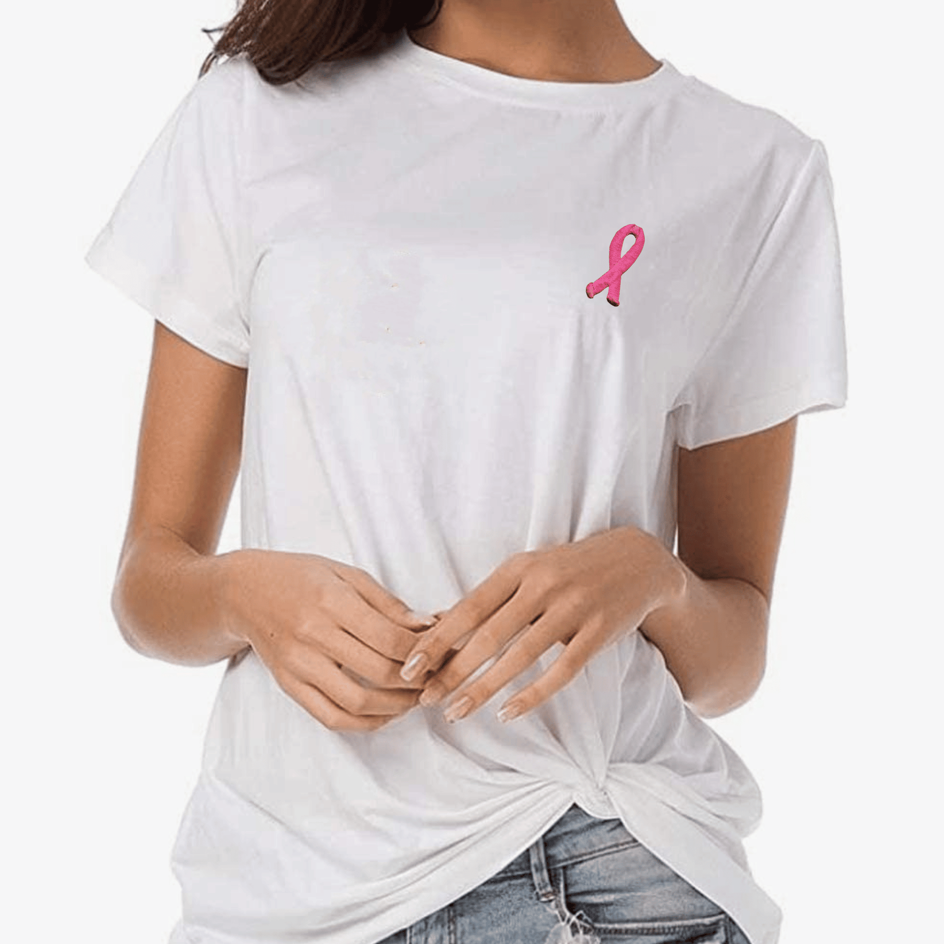 A woman wearing a white t-shirt with Breast Cancer Patches (5-Pack) Awareness Embroidered Iron On Patch Applique 2" on it.