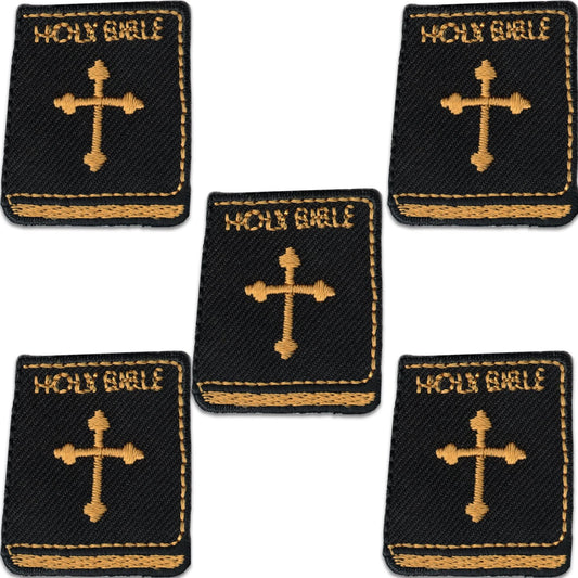 Set of five Holy Bible Religious Iron On Patches by Laughing Lizards, shaped like black books with gold embroidered crosses and "HOLY BIBLE" text, arranged on a white background. Each patch features detailed yellow embroidery for a bold look.