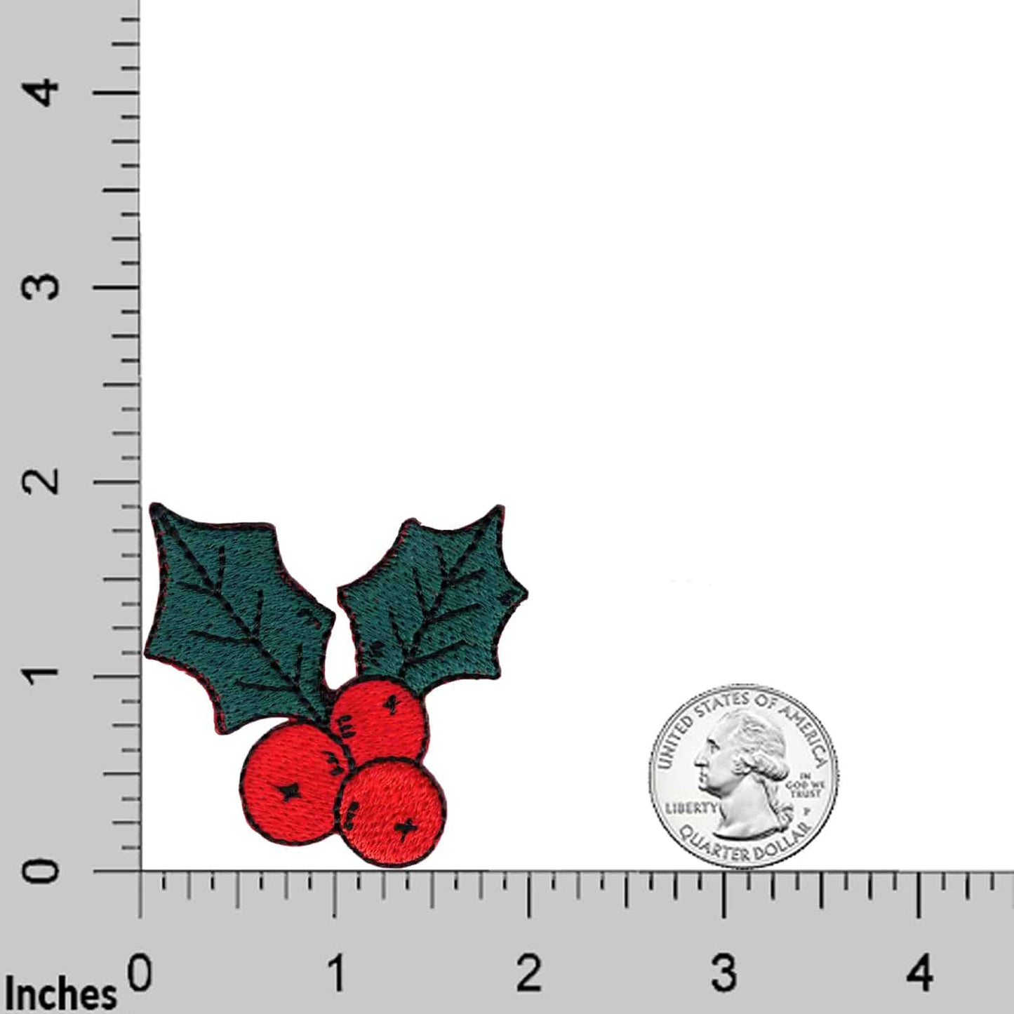 The Laughing Lizards Christmas Holly (3 Pack) embroidered iron-on patch applique is shown next to a U.S. quarter on an inch-marked ruler for size comparison.
