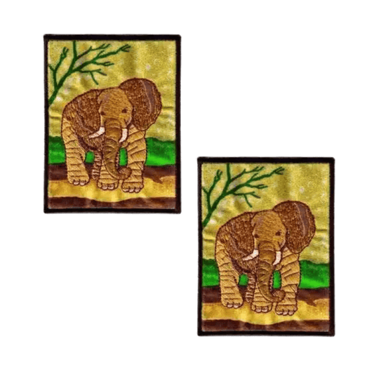 The Laughing Lizards "Elephant in Natural Environment Jungle Iron On Patch" features two rectangular patches with an elephant walking among green branches on a yellow-brown background, capturing an African safari vibe.