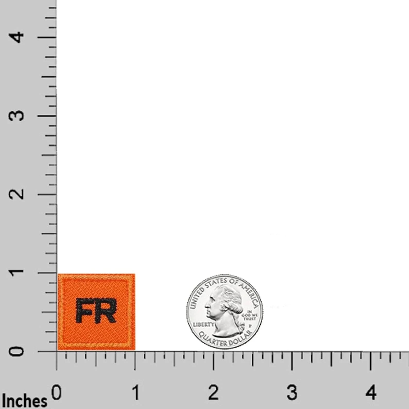 A Laughing Lizards FR Patches for clothing iron on (10-Pack) replacement badge is shown in orange, labeled "FR," next to a U.S. quarter on an inch-marked grid—ideal for adding flame-resistant safety and visibility to your gear.
