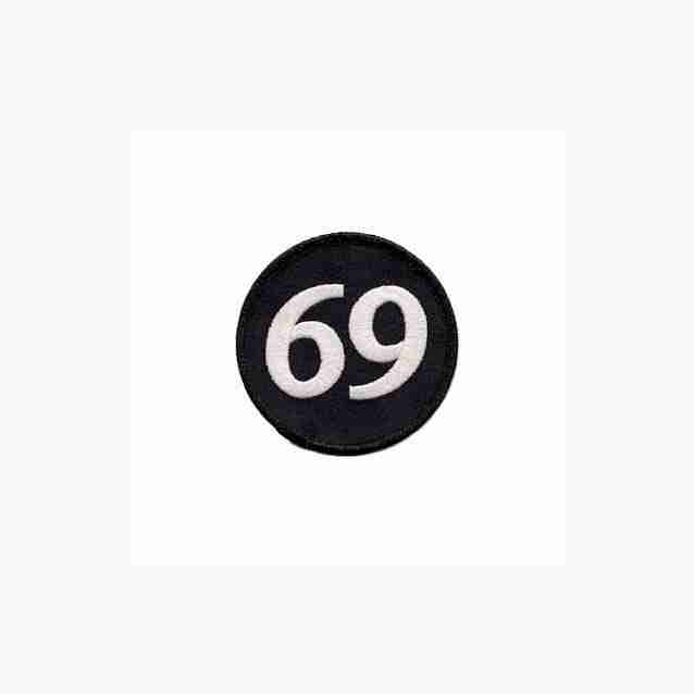 A black 69 Embroidered Iron On Patch - 3" Round button with the number 69 on it.