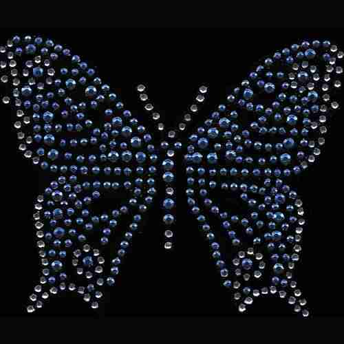 A Medium Rhinestone/Rhinestud Butterfly Iron On Hotfix Applique: Blue made of blue crystals on a black background.
