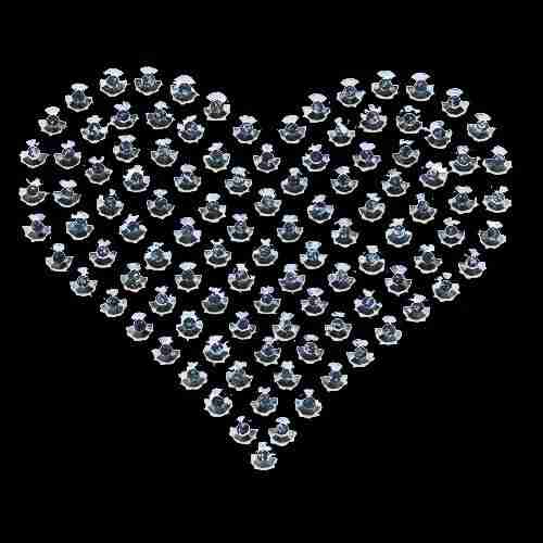 A Rhinestud Heart Iron On Hotfix Applique: Large - Silver made of small crystals on a black background.