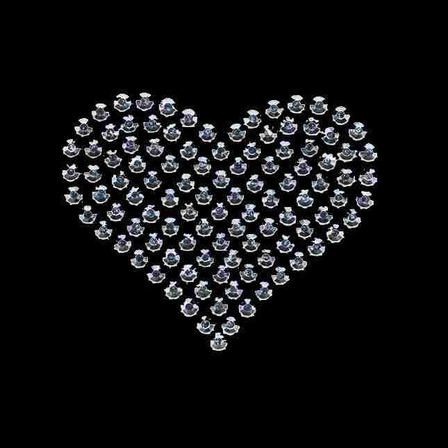 A Rhinestud Heart Iron On Hotfix Applique: Medium - Silver made of crystals on a black background.