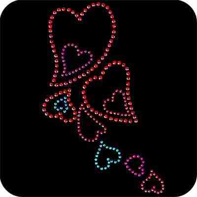 Rhinestud Floating Hearts Iron On Applique on a black background.