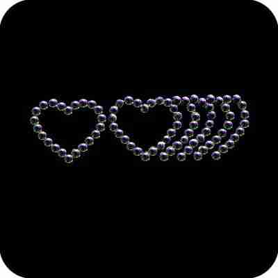 Three Small Trailing Hearts Iron On Rhinestone Appliques on a black background.