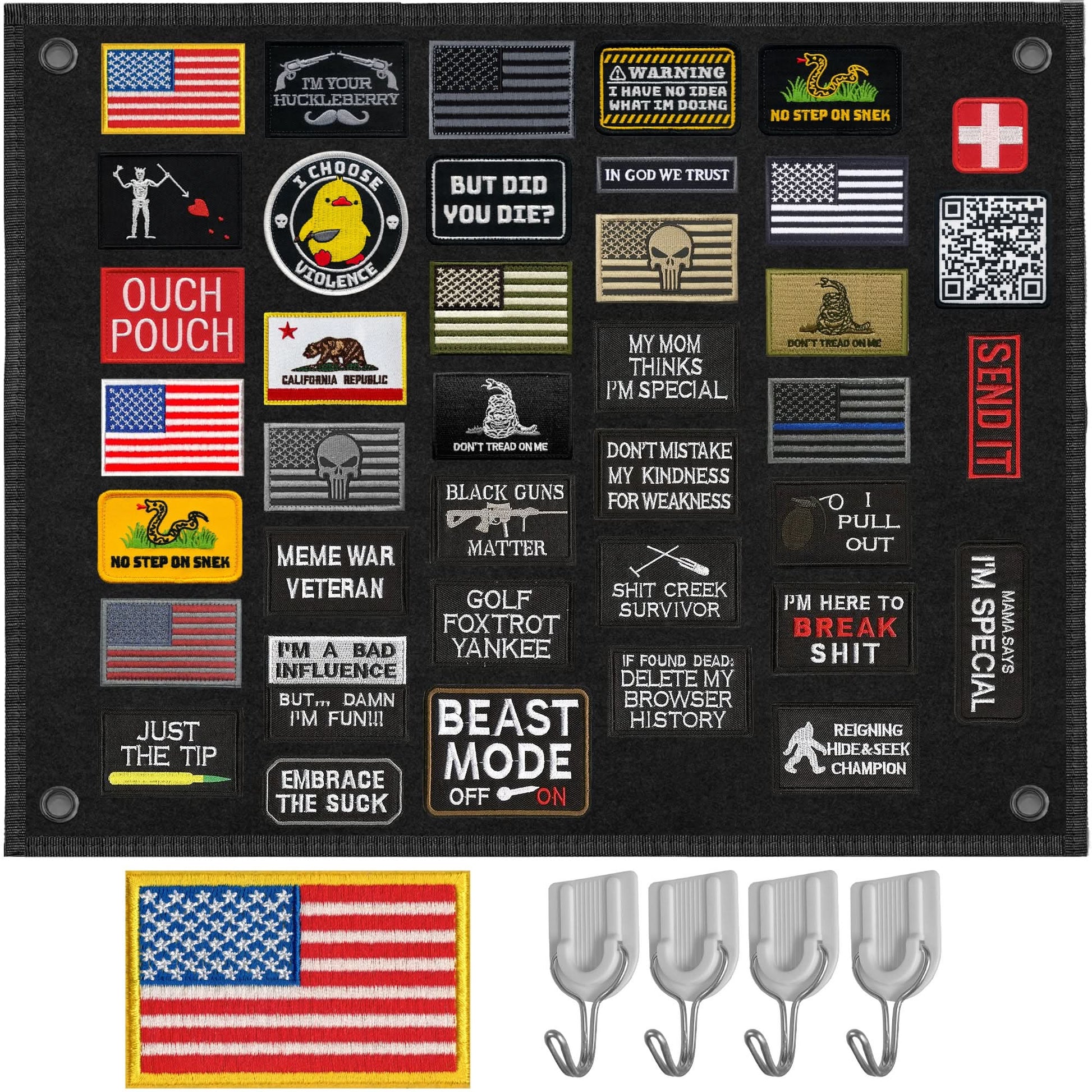 A black fabric patch panel displays various military-style morale patches with humorous and motivational phrases. Below the panel is a patch of the U.S. flag and four metal hooks.