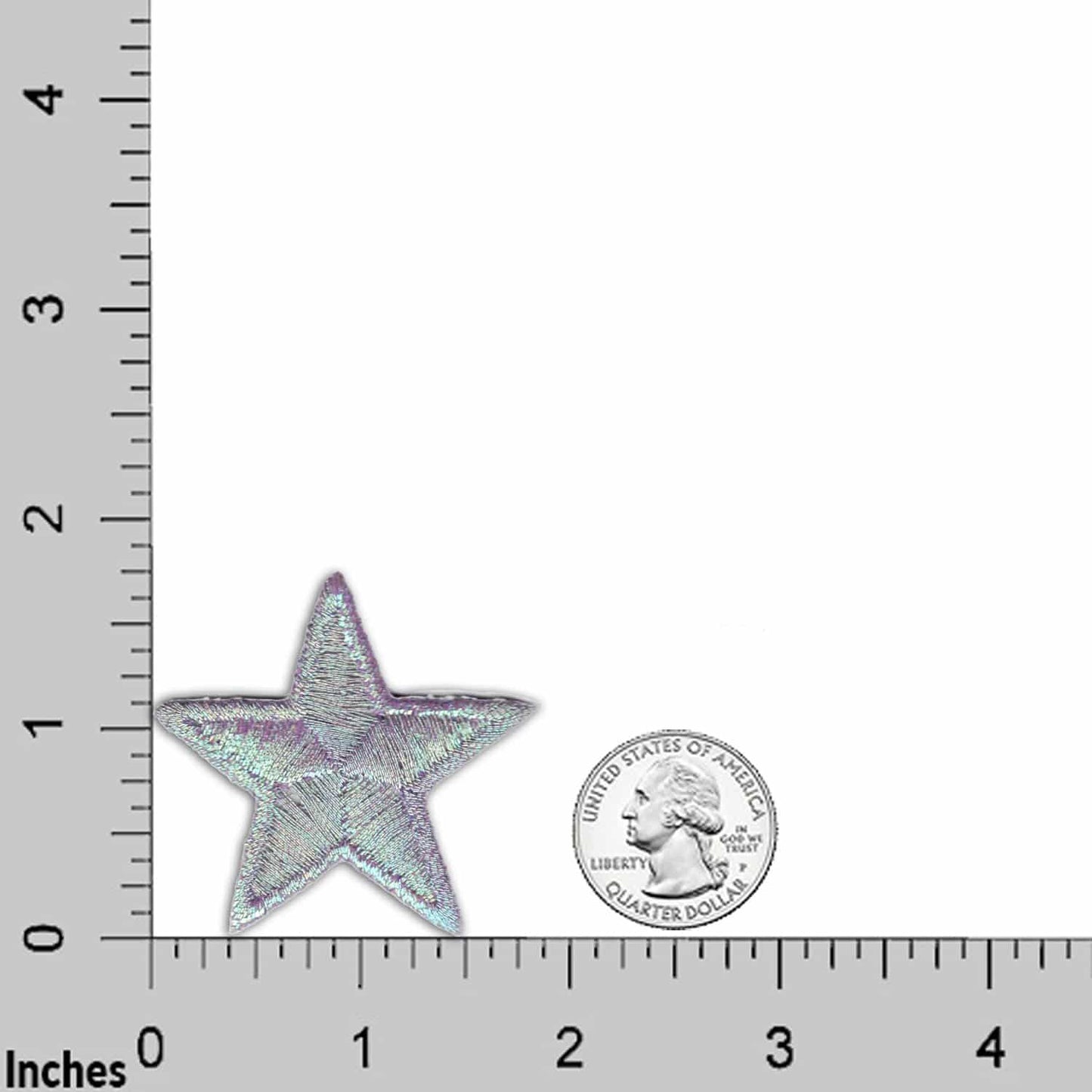 A star shaped coin next to a ruler.