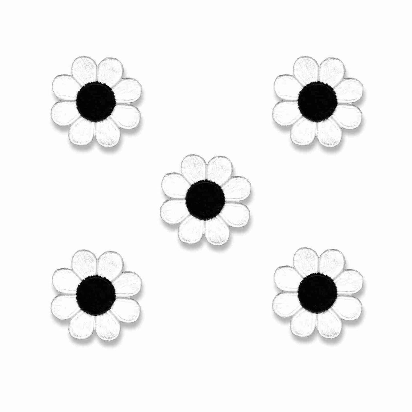Four Cute Daisy Patches (5 Pack) Flower Embroidered Iron On Patch Appliques - 4 Color Choices! on a white background.