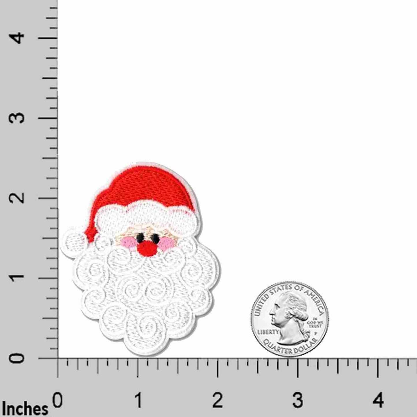 A Santa Claus Face Patches (2 Pack) Christmas Embroidered Iron On Patch Appliques on a ruler.