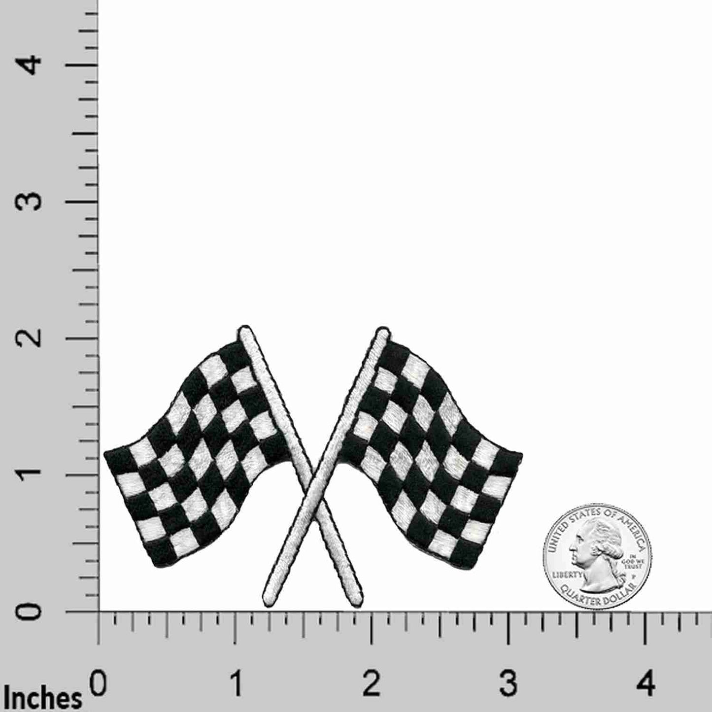 Two Checkered Flags Racing Iron on Patches (2-Pack) on a ruler.