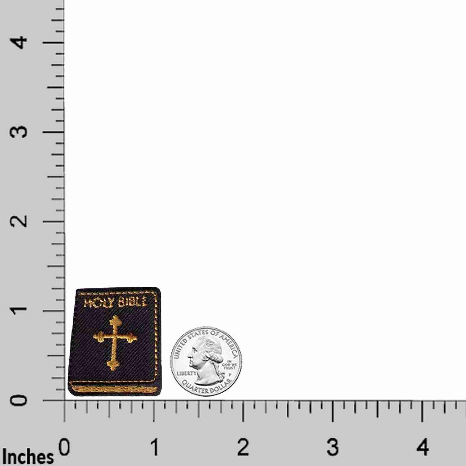 A Holy Bible Religious Iron On Patch (5 Pack) with a coin and a ruler next to it.