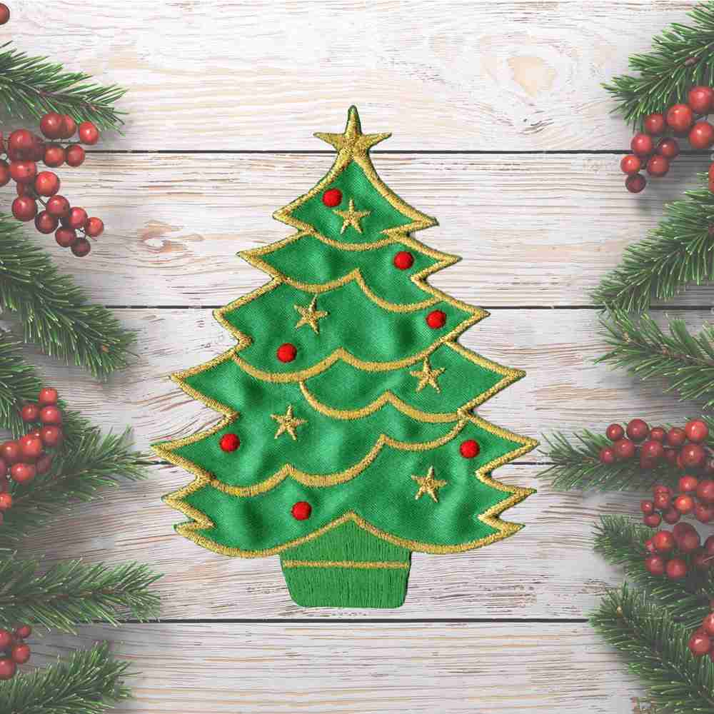 A Christmas Tree Holiday Iron On Patch embroidered on a wooden background.