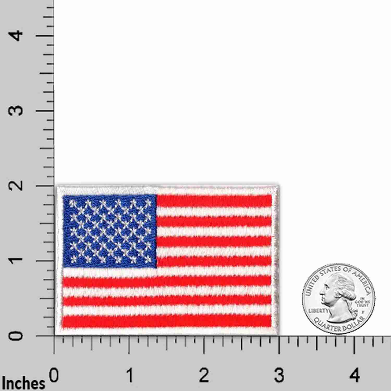 An USA Flag Patches (2-Pack) American Flag Embroidered Iron On Patch Appliques on a ruler.