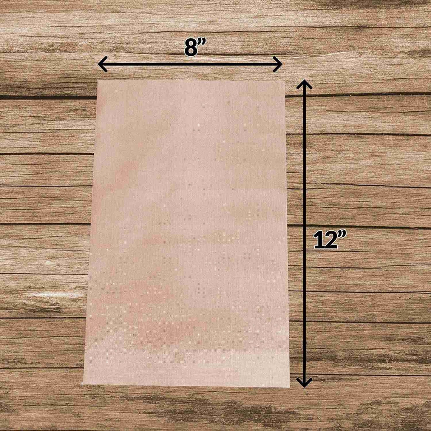 A Patch Pressing Sheet on top of a wooden table.