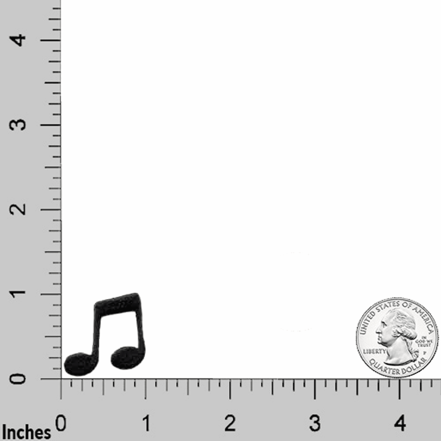 A Musical Note Patch (10-Pack) Music Embroidered Iron On Patch Appliques - Small is shown next to a ruler.