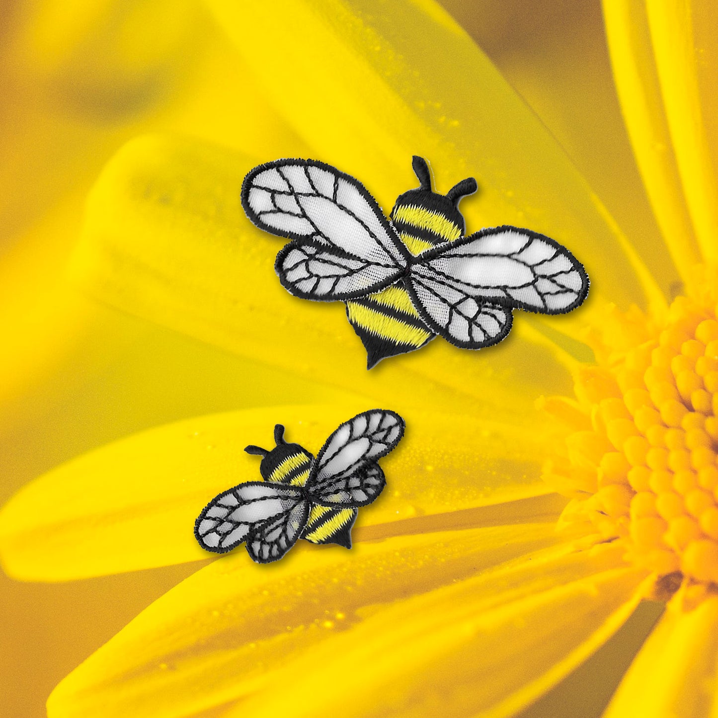 Two Bee Patches with Chiffon Wings (5 Pack) Insect Embroidered Iron on Patch Appliques on a yellow flower.