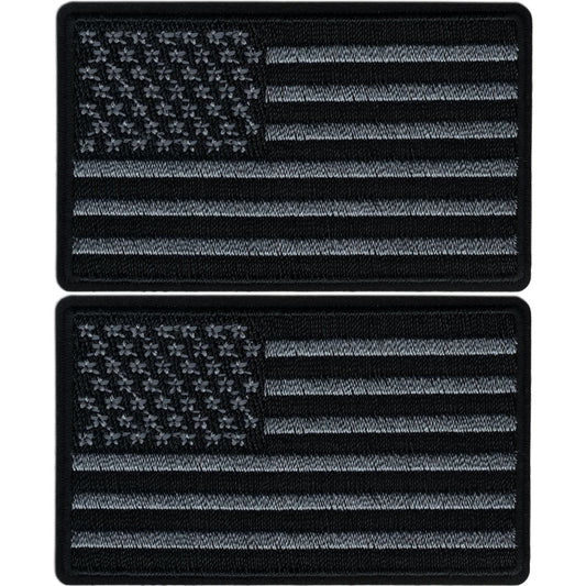 The Laughing Lizards Black & Gray USA Flag Patches 2-Pack features embroidered American flag iron-on appliques—perfect patriotic additions for any collection.