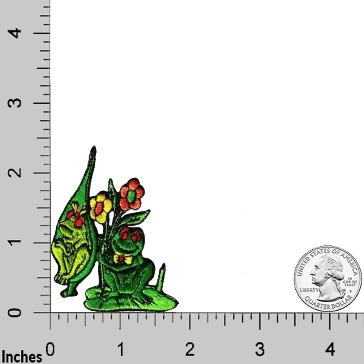 Three "Courting Frog on Lilypad" iron-on patches by Laughing Lizards are shown next to a U.S. quarter on an inch grid—perfect for DIY crafts, decorating, or pairing with other embroidered or applique patches.
